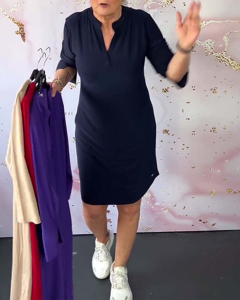 Robe avec décolleté en V unicolore