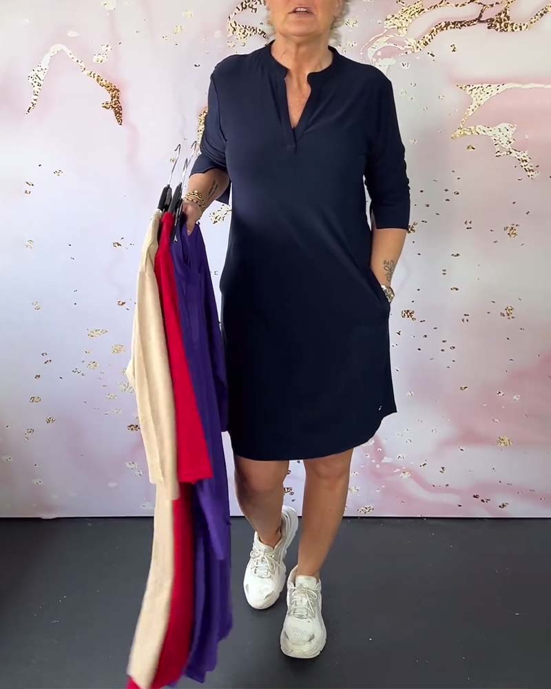 Robe avec décolleté en V unicolore